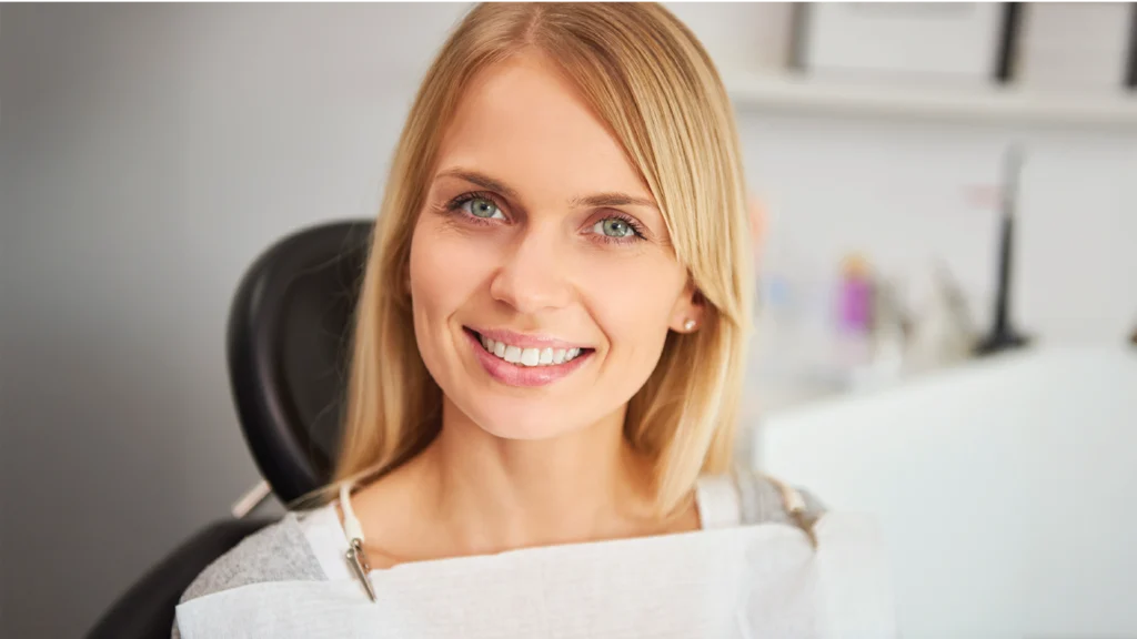 Woman with radiant skin and healthy smile after dental visit in Albuquerque.